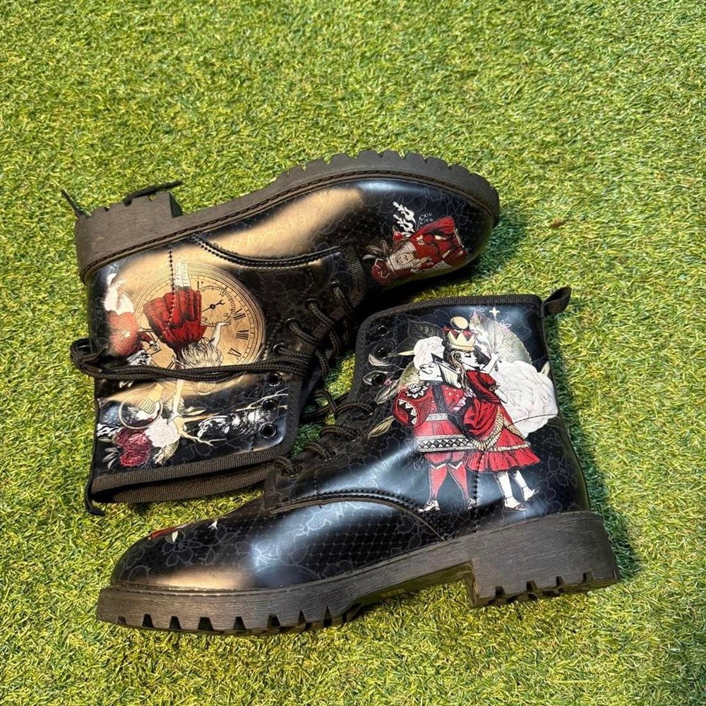Black & red Alice in Wonderland boots with graphic of a woman in a red dress